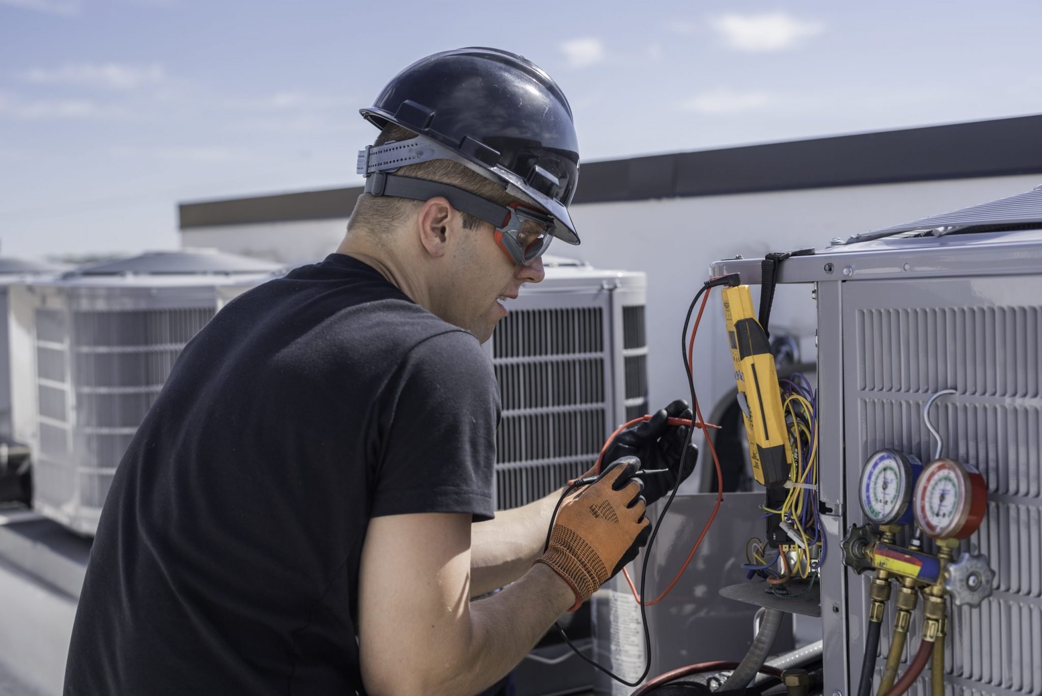 Technician inspecting HVAC system